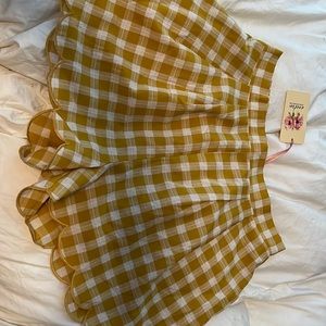 Yellow / gold shorts